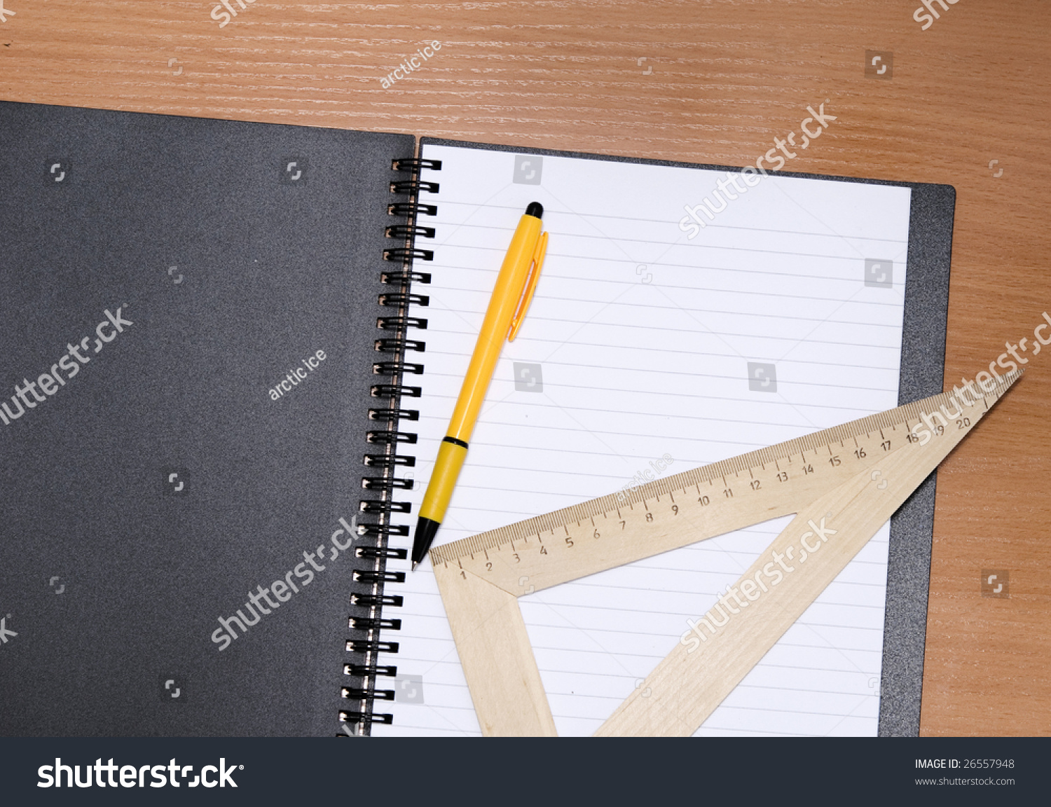 Notebook, Pencil, Ruler On A Wooden Background Stock Photo 26557948