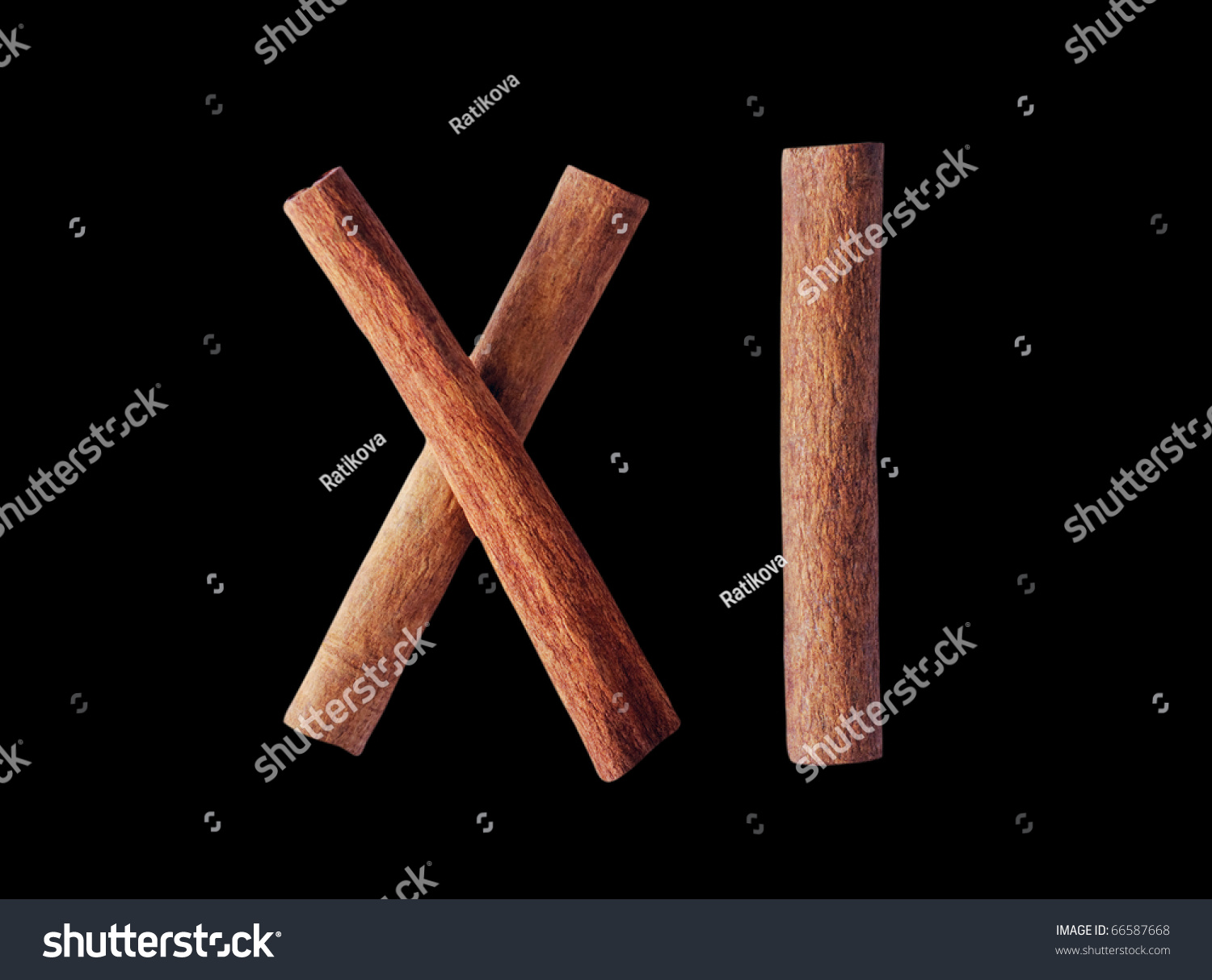 number-eleven-roman-numerals-from-cinnamon-sticks-isolated-on-the-black-with-paths-stock-photo