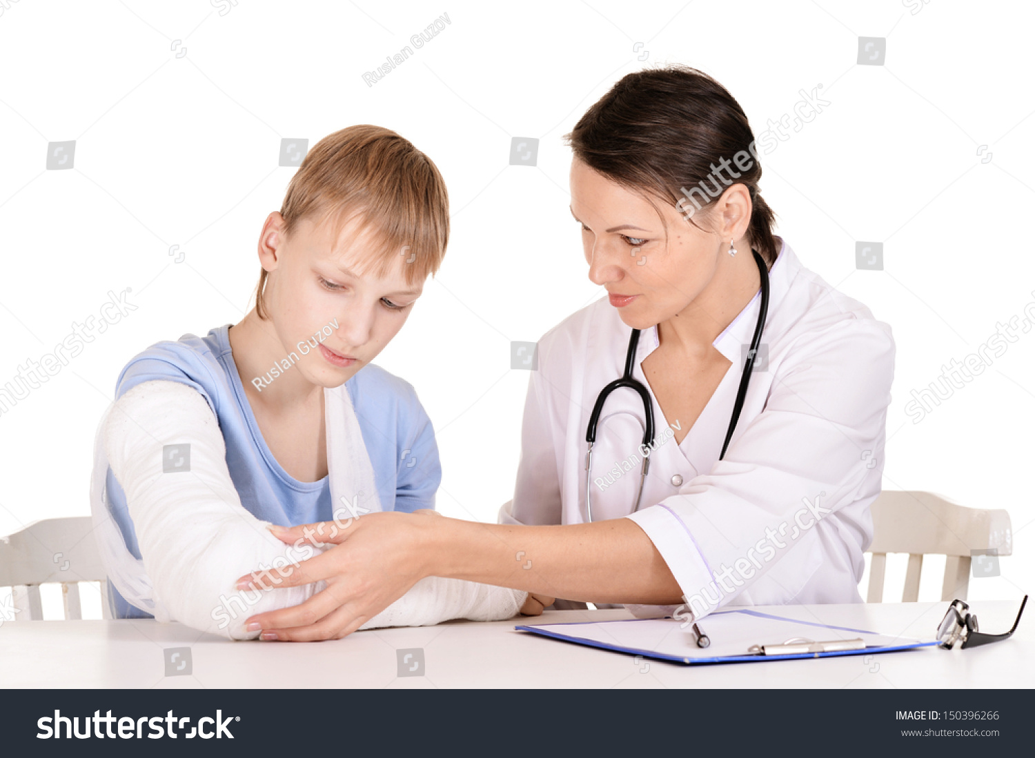nurse and young boy with a broken arm nurse and young boy with a broken arm