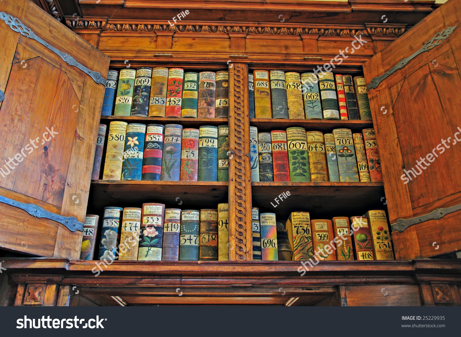 Old Books On A Medieval Bookshelf In Prague Castle Stock Photo