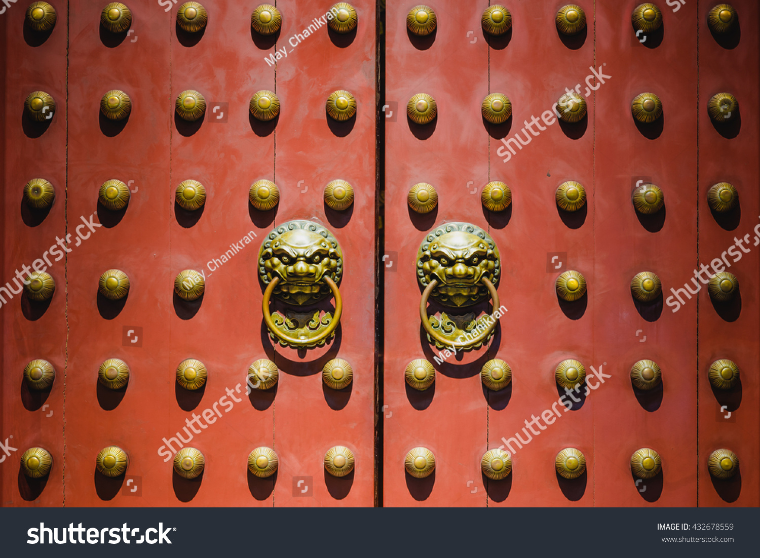 Old chinese door style with lion head knocker Old chinese door style with lion head knocker