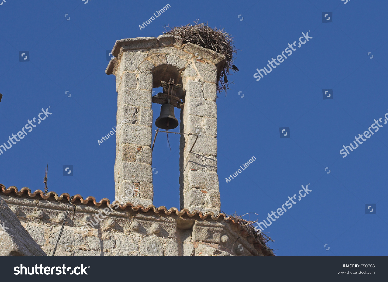European Bell Tower With Stork Nest European Bell Tower With Stork Nest Stock Photo 750768