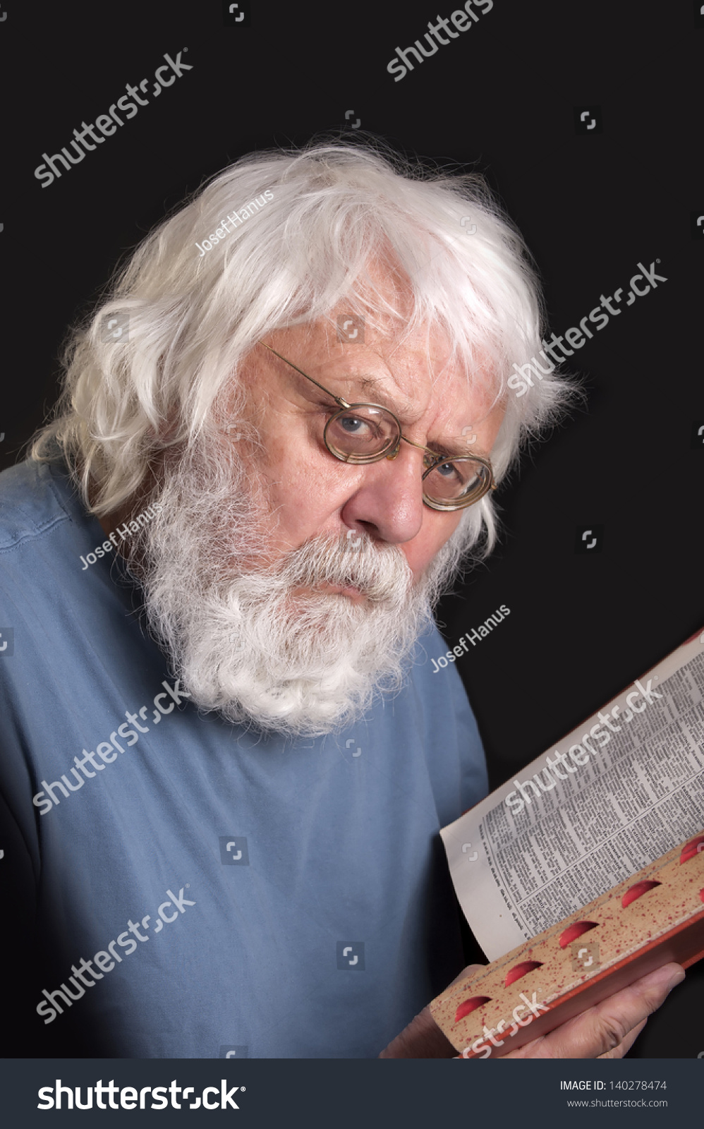 Old Man Reading A Book Scientist And Teacher With Beard