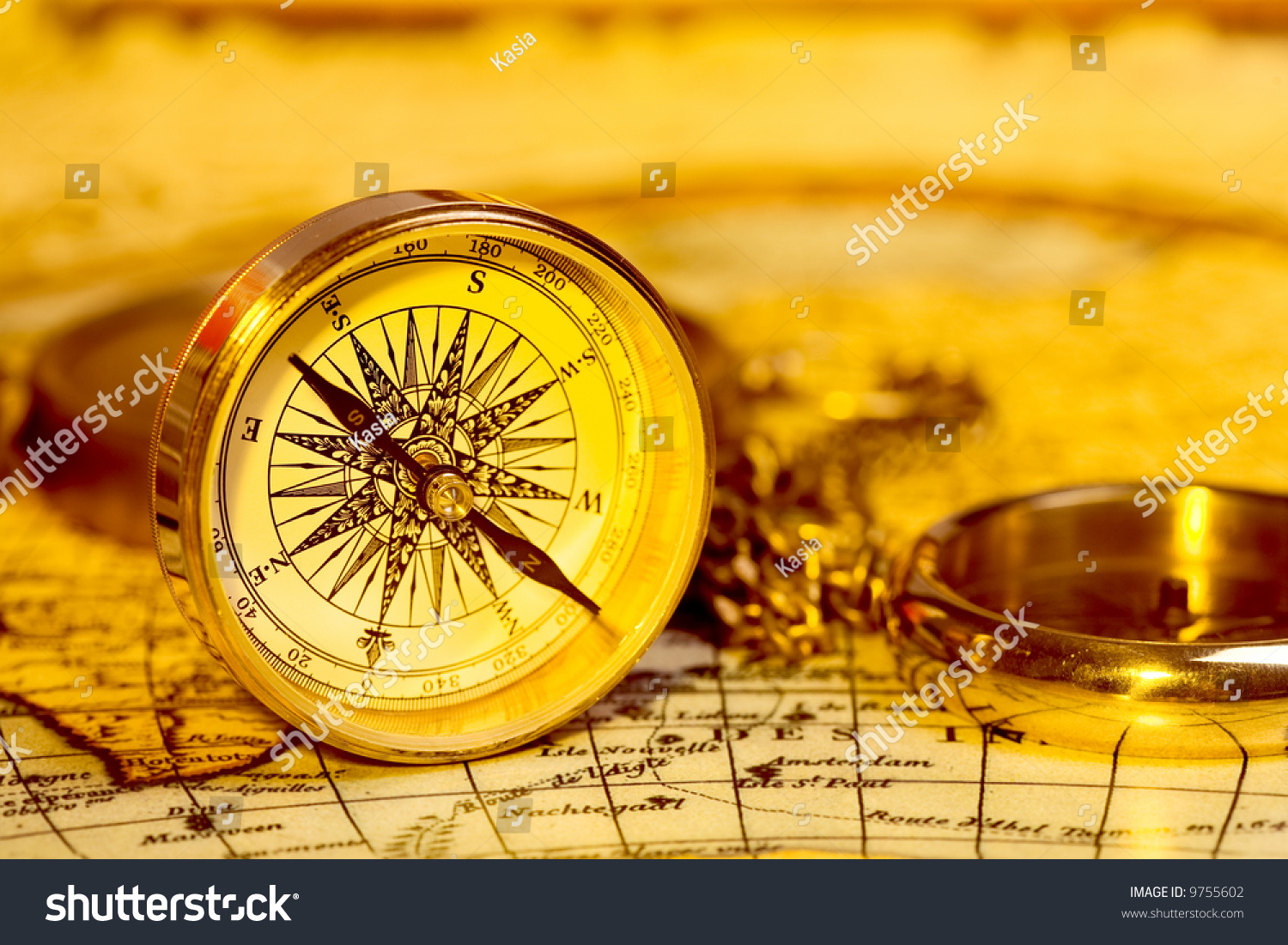Old Style Gold Compass On Antique World Map Stock Photo 9755602