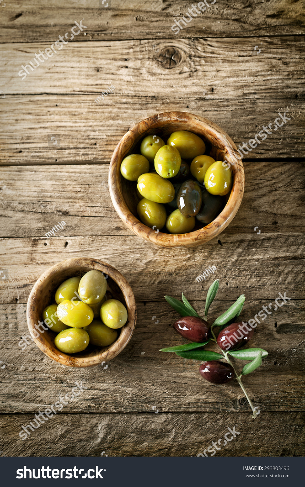 olives on old wood Wooden table with olives and olive oil olives on old wood Wooden table with olives and olive oil