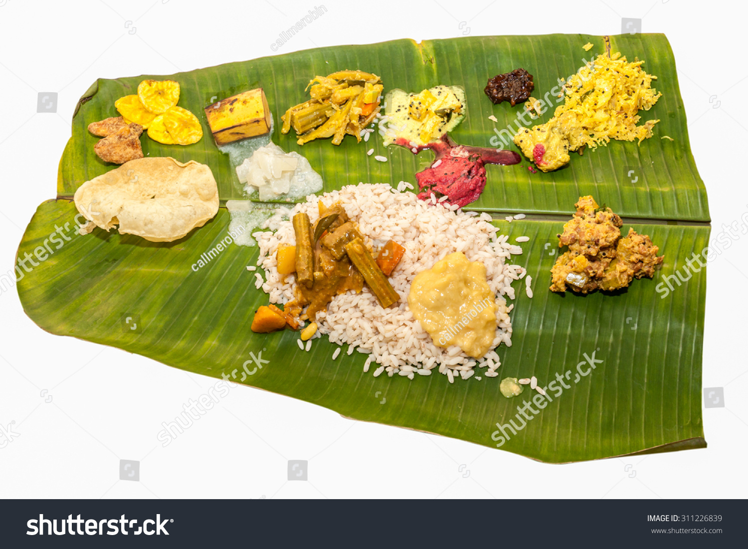 Onam Sadhya Is Kerala Vegetarian Lunch Served On A Banana Leaf On The