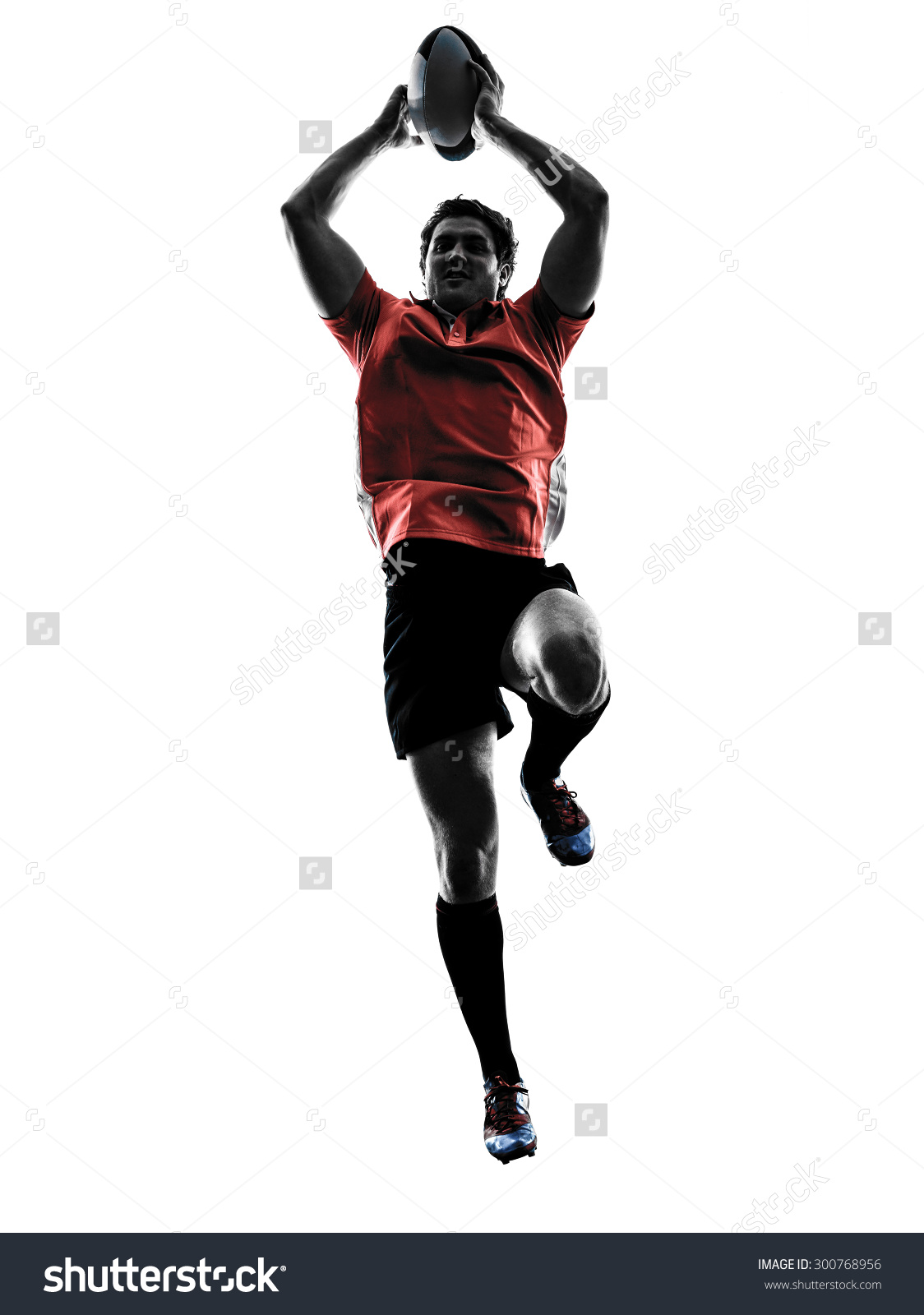 one caucasian rugby man player in studio silhouette isolated on white background one caucasian rugby man player in studio silhouette isolated on white background