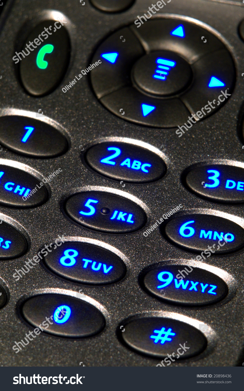 Open Flip Cell Phone With Backlit Key Pad With Glowing Blue Number Keys