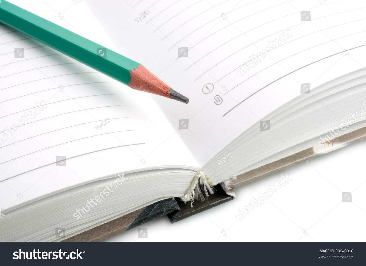 Opening book and pencil on white background Opening book and pencil on white background