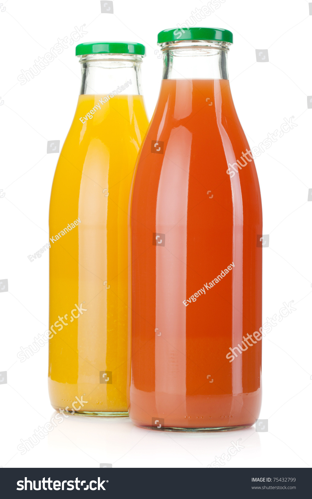 Grapefruit And Orange Juice On White Background Orange Grapefruit Juice Bottles Isolated On Stock Photo