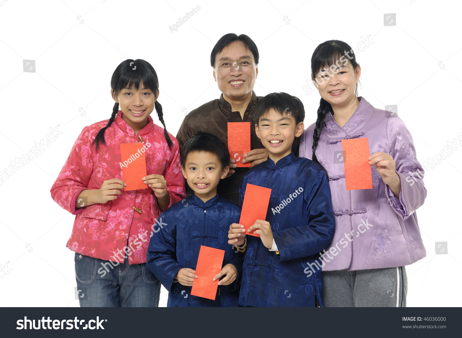 Oriental Family With Wearing Chinese Traditional Dress Holding A Red