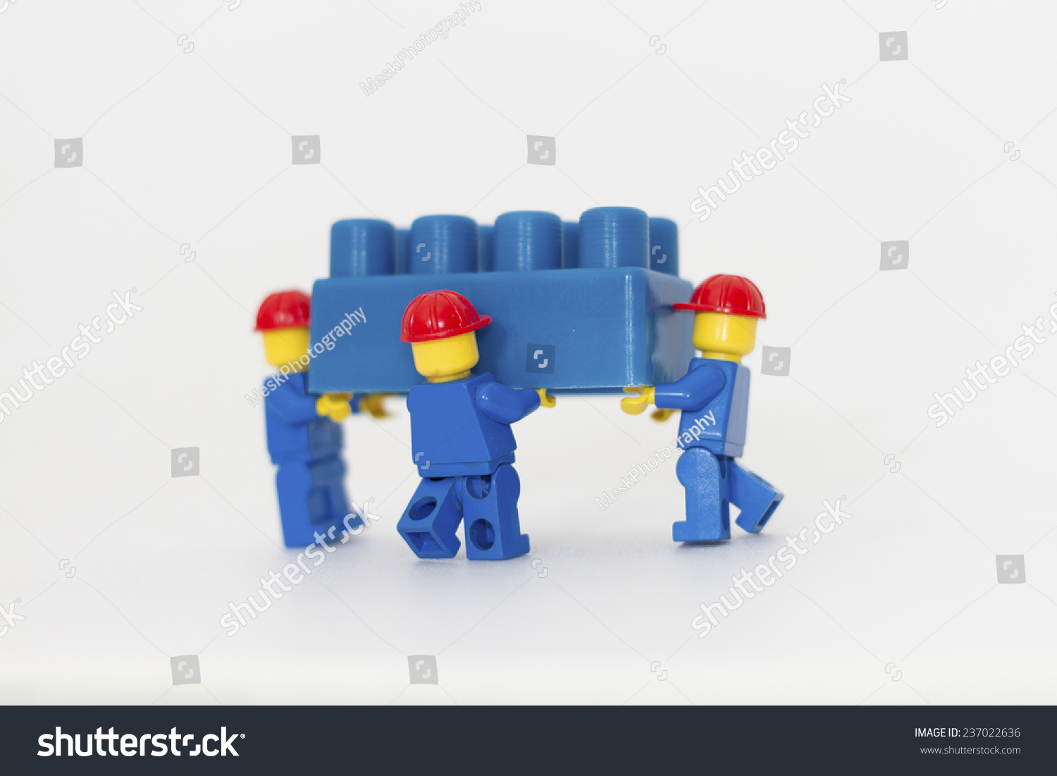 Orvieto Italy December 10th 2014 Lego mini figure workman at work on white background Lego is a popular line of construction toys manufactured by the Lego Group Orvieto Italy December 10th 2014 Lego mini figure workman at work on white background Lego is a popular line of construction toys manufactured by the Lego Group