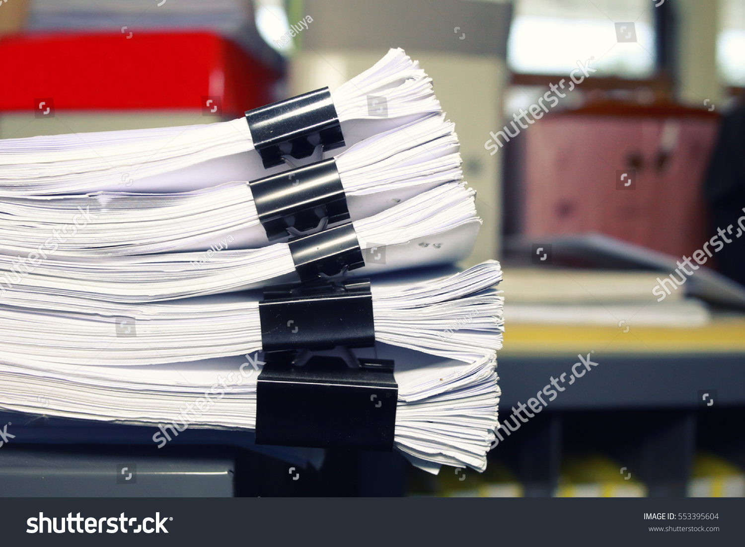 Paper documents stacked in archive Paper documents stacked in archive