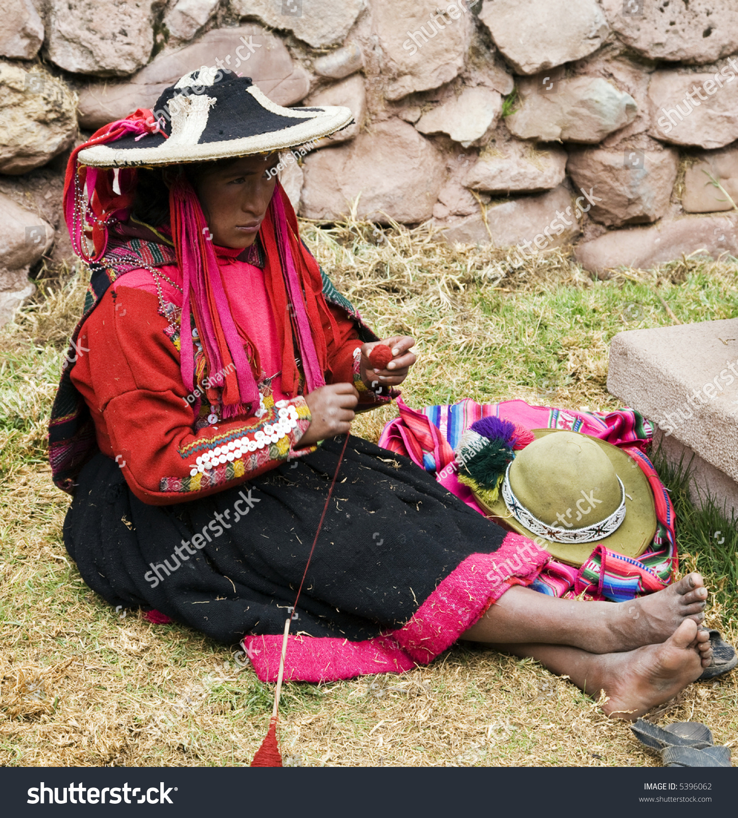 Peruvian Inca Women In Traditional Dress Weaving Stock Photo 5396062