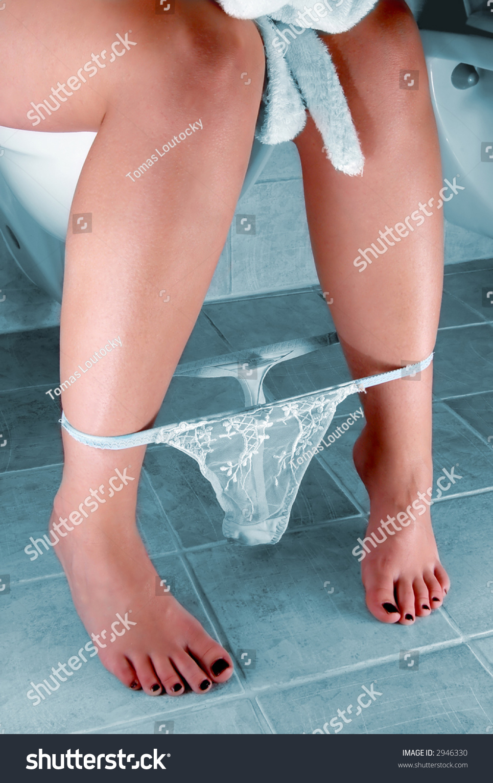 Photo Of Woman Sitting On A Toilet. - 2946330 : Shutterstock