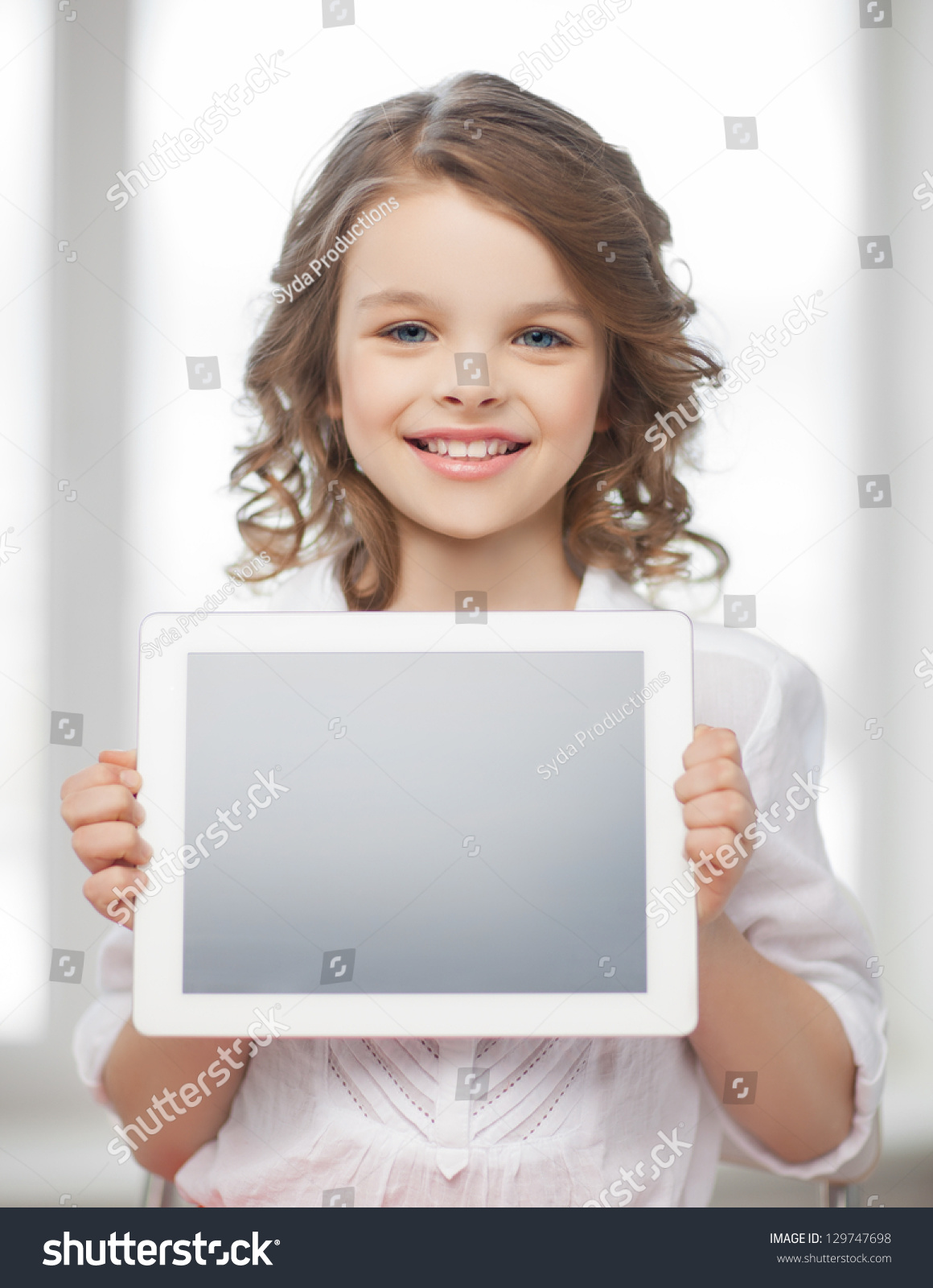 Picture Of Beautiful PreTeen Girl With Tablet Pc Stock Phot