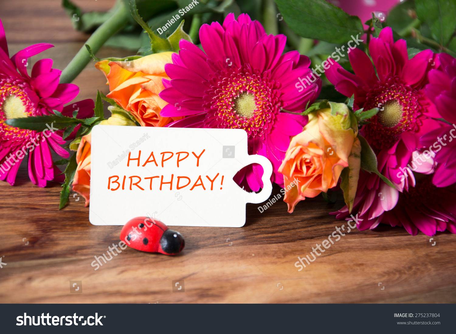 Pink Flowers And Card With Lettering Happy Birthday Stock Photo