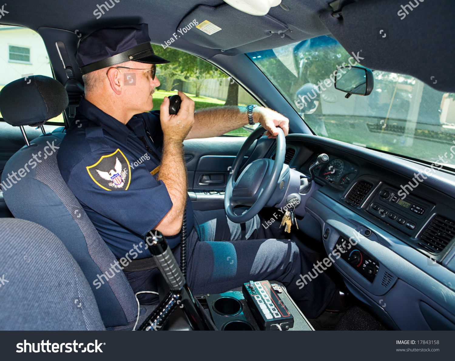 police talking officer radio squad shutterstock