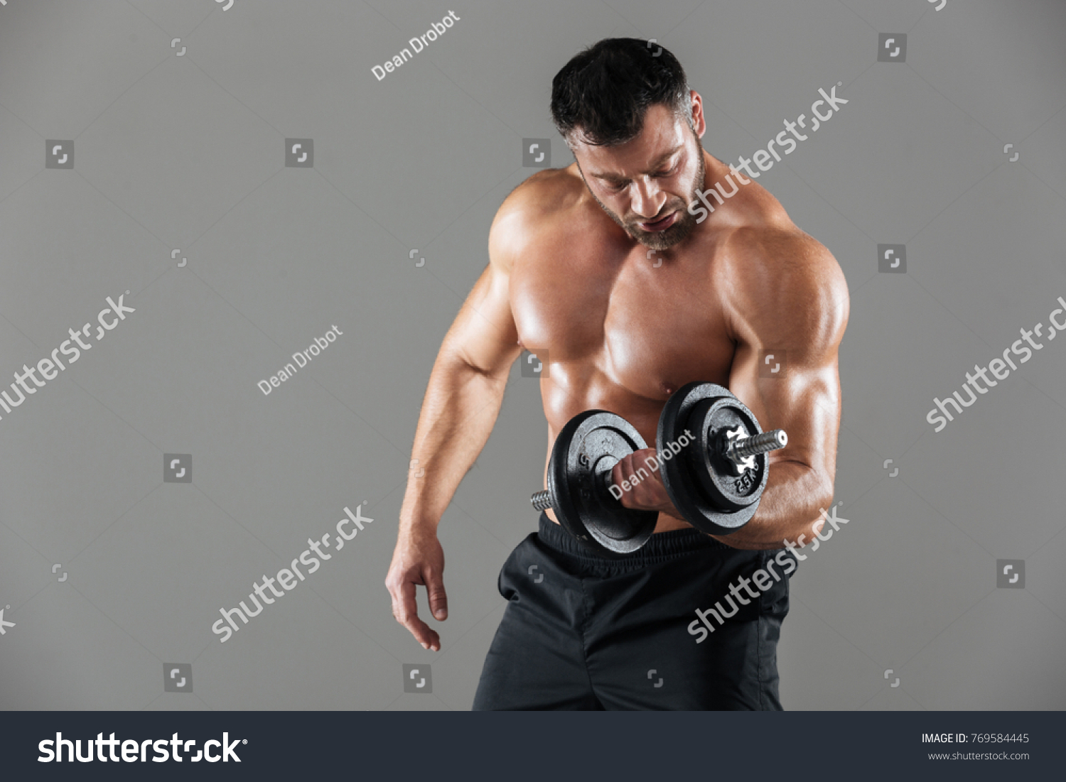 Portrait Concentrated Strong Shirtless Male Bodybuilder Stock Photo