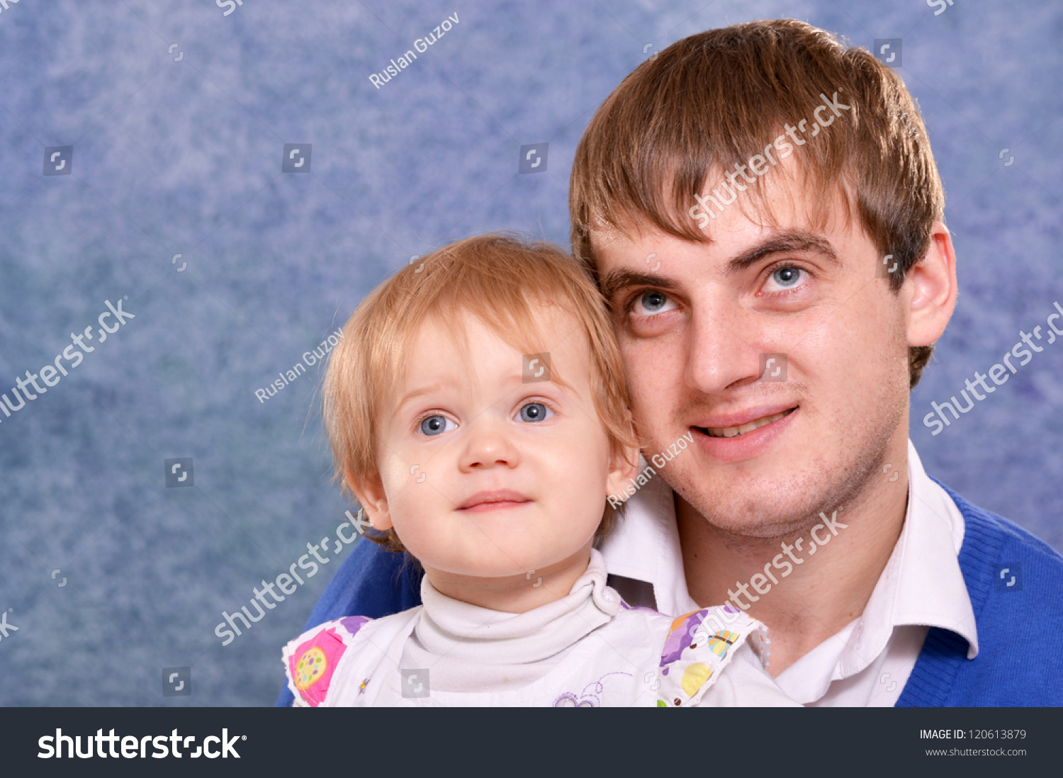 Portrait Of A Cute Young Family Posing Stock Photo 120613879 : Shutterstock