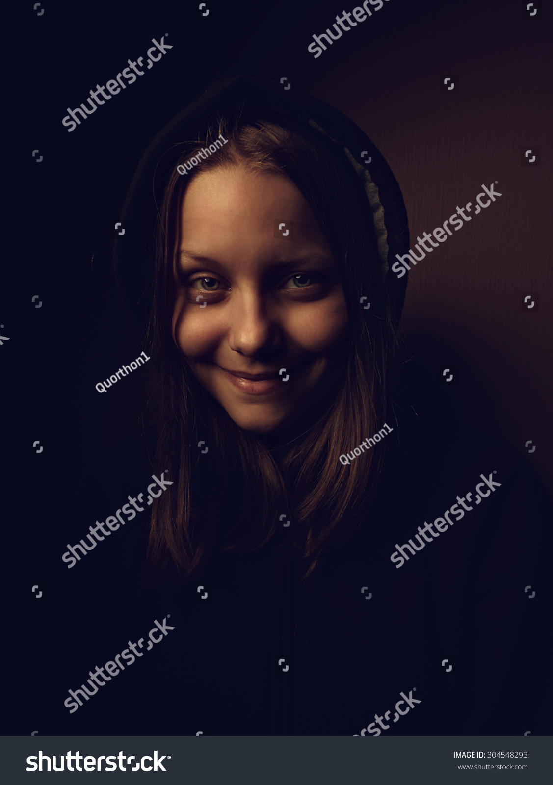 Portrait Of A Devil Teen Girl With A Sinister Smile ...