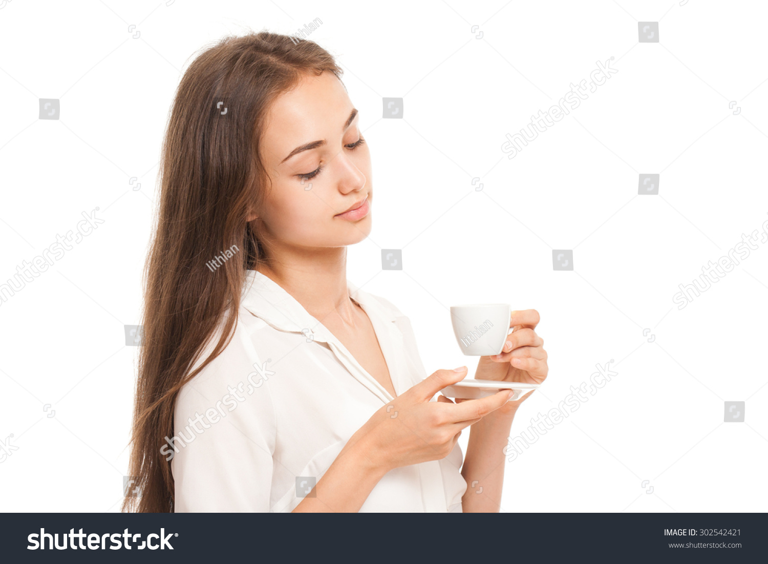 Portrait of a gorgeous young brunette woman having a cup of espresso coffee Portrait of a gorgeous young brunette woman having a cup of espresso coffee