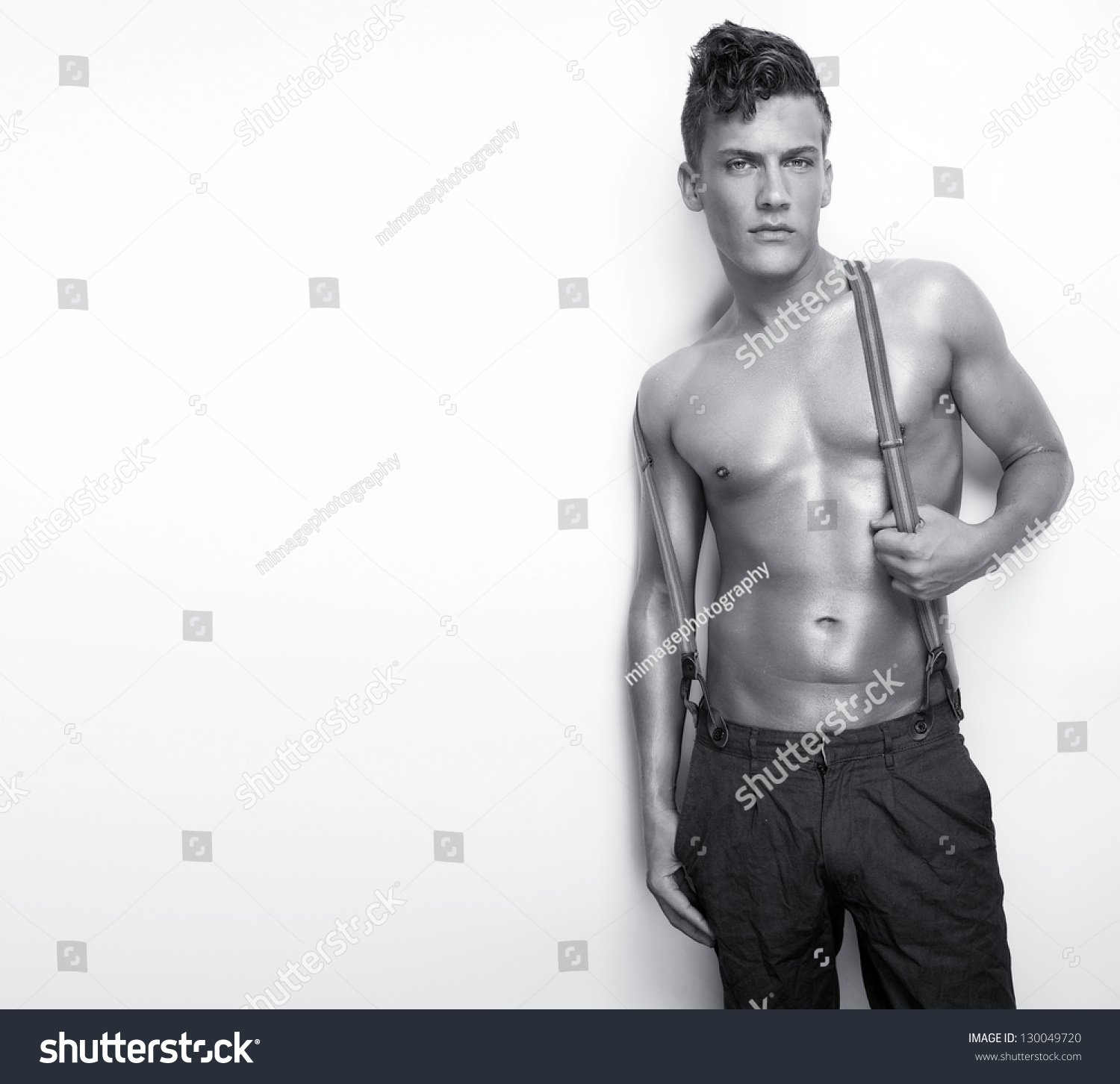 Portrait Of A Sexy Man Shirtless Leaning Against Wall Stock Photo Shutterstock