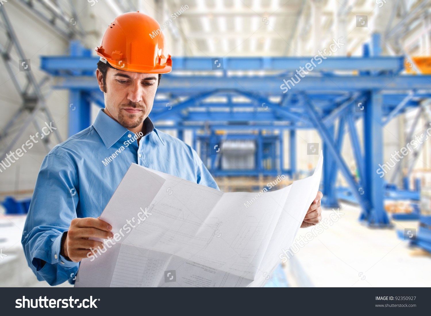 http://image.shutterstock.com/z/stock-photo-portrait-of-a-site-manager-reading-a-drawing-92350927.jpg