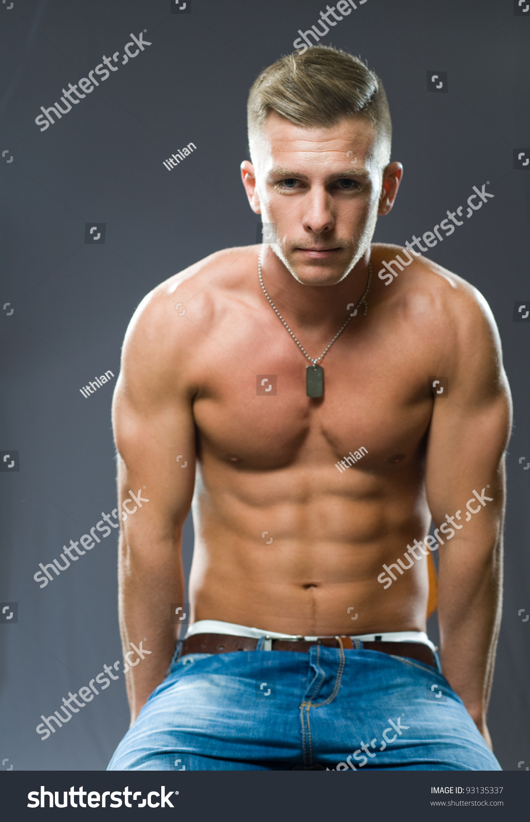 Portrait Of A Very Fit, Ripped Young Man Flexing Muscles. Stock Photo ...