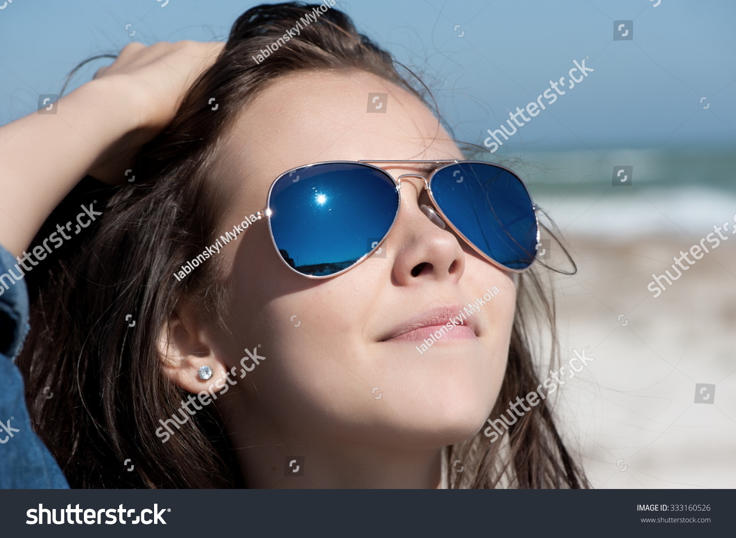 Portrait Of A Young Beautiful Brunette Girl In Sunglasses Looking At The Sky Close Up Stock 