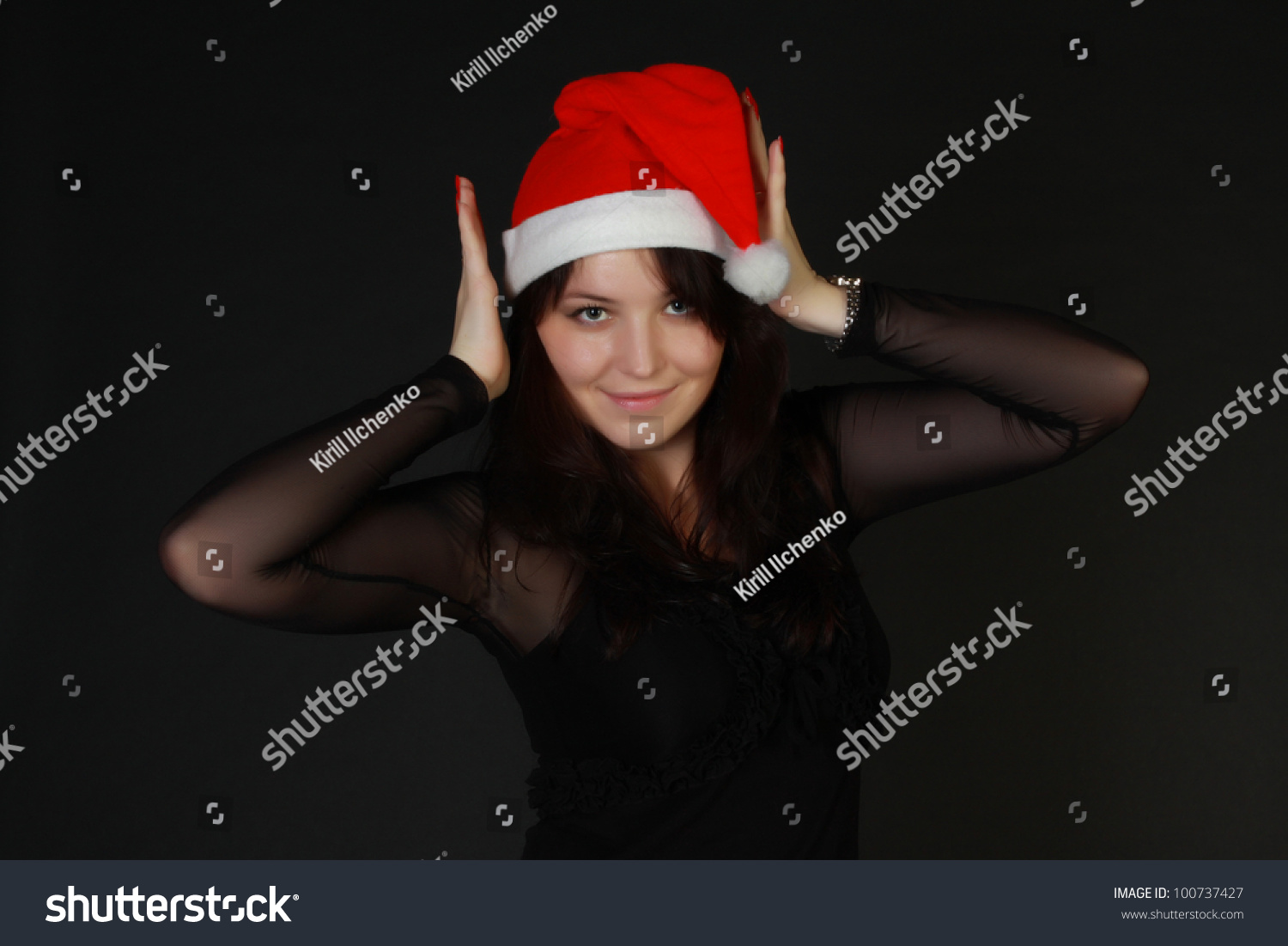Portrait Of Beautiful Brunette Woman Wearing Sexy Santa Claus Clothes