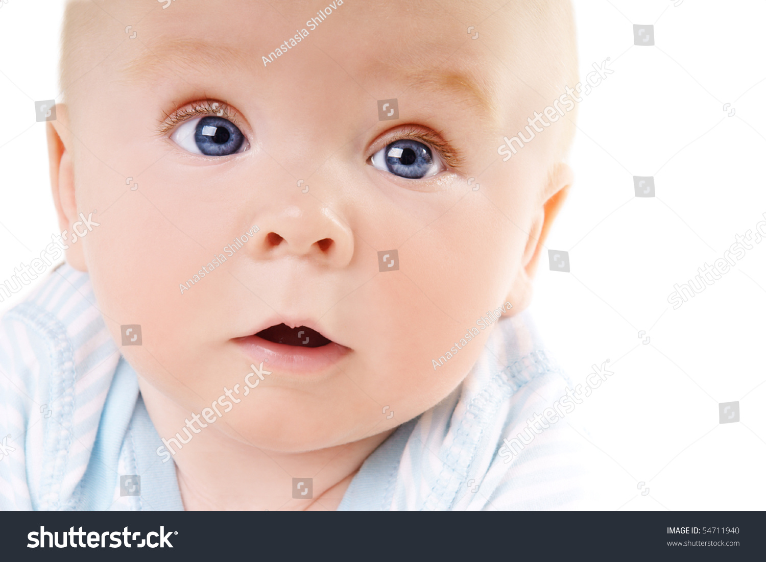 Portrait Of Cute Baby Boy With Blue Eyes On White Background Stock