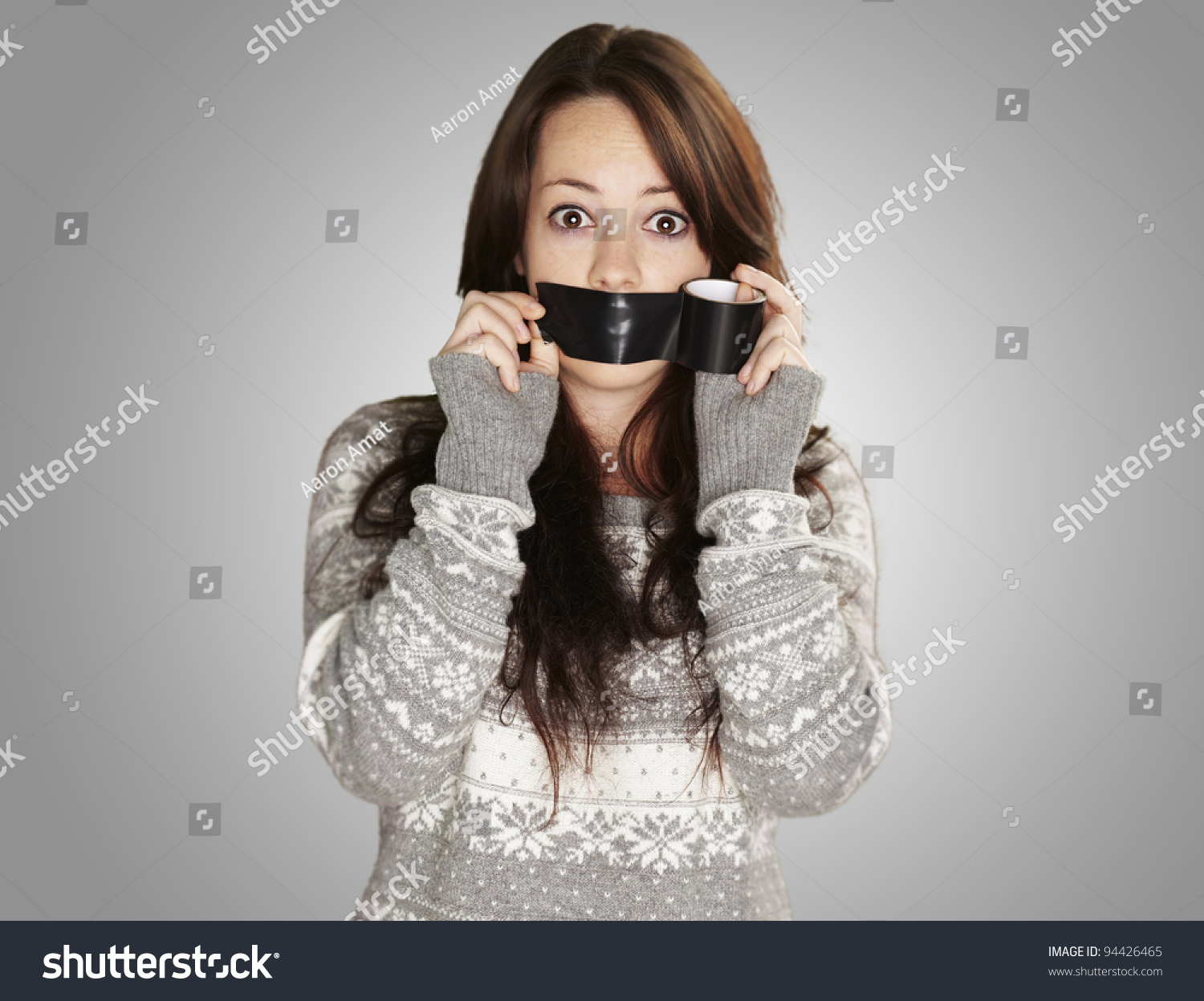 Portrait Of Scared Girl Being Silenced By Herself Over