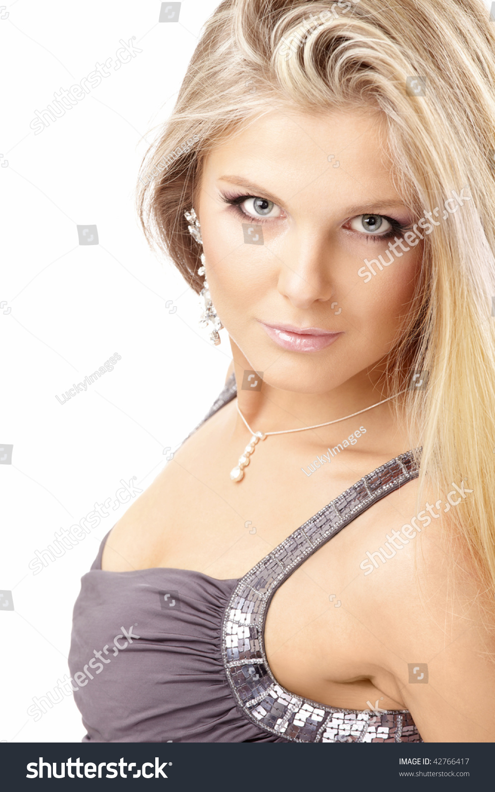 Portrait Of The Sexual Blonde With The Jewelry Isolated Stock Photo