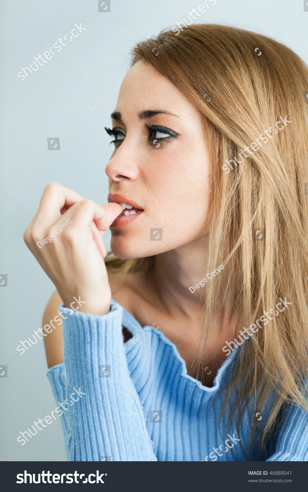 Thirty Year Old Women In Shape | portrait of 30 years old woman biting her fingernails on Thirty Year Old Women In Shape | portrait of 30 years old woman biting her fingernails on