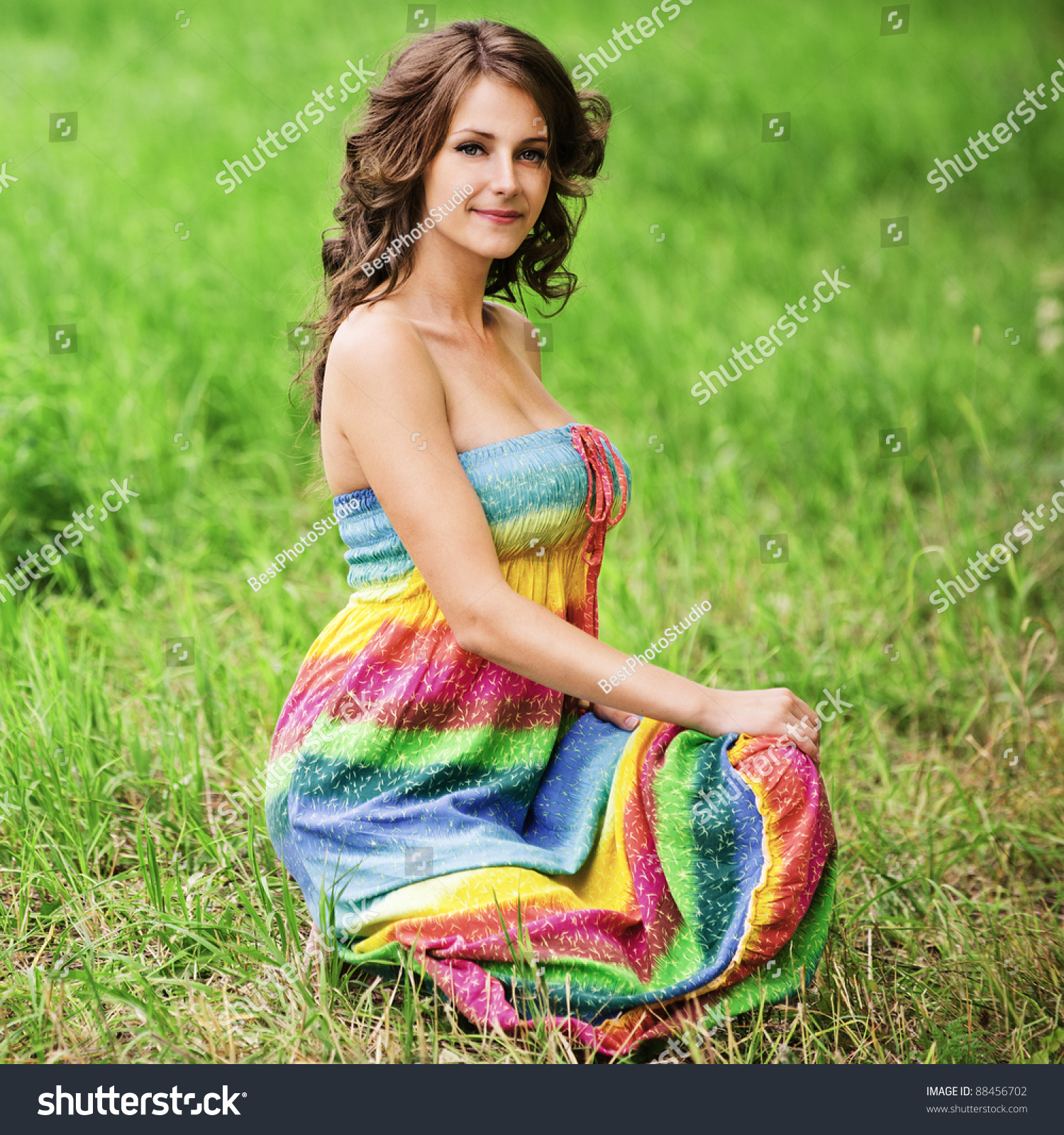 Portrait Of Young Beautiful Brunette Woman Wearing Colourful Bright