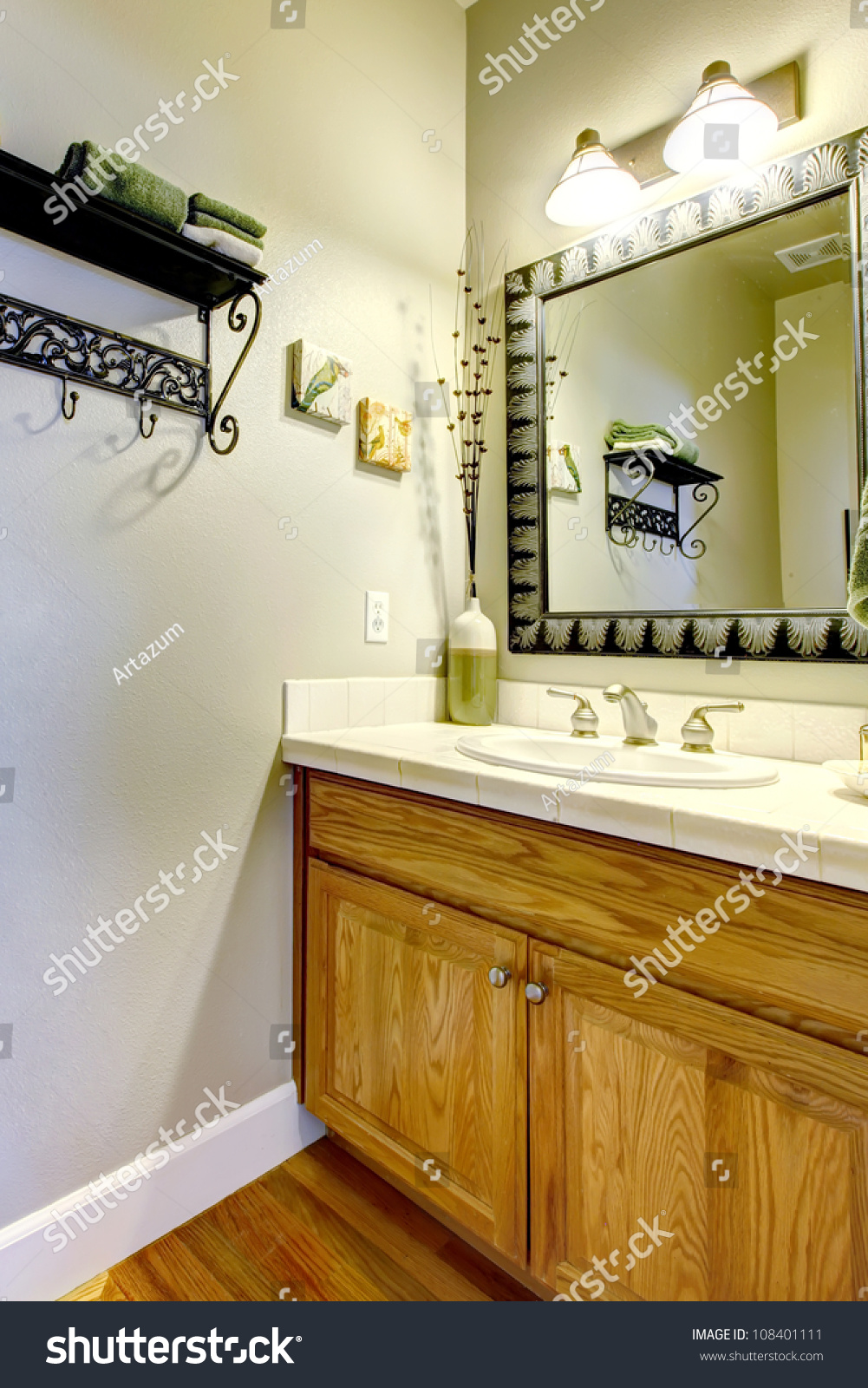 Powder Room Or Bathroom With Sink And Wood Cabinet. Stock Photo