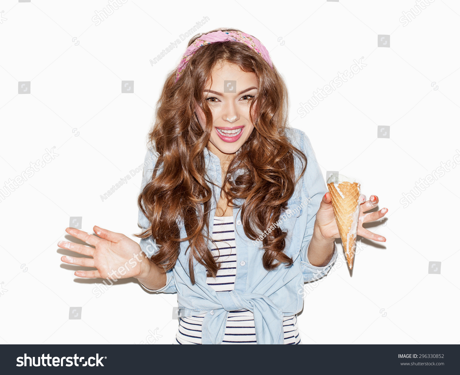 Pretty Brunette Girl Having Fun And Eating Ice Cream Surprised