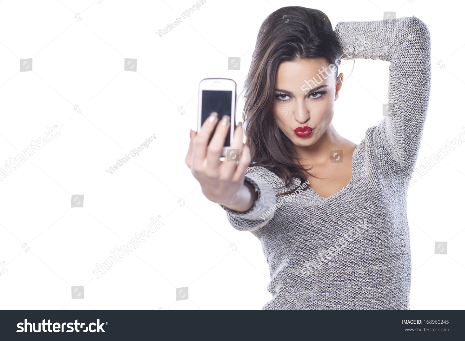 Pretty Girl Make A Duck Face And Take A Self Portrait With Her Smart