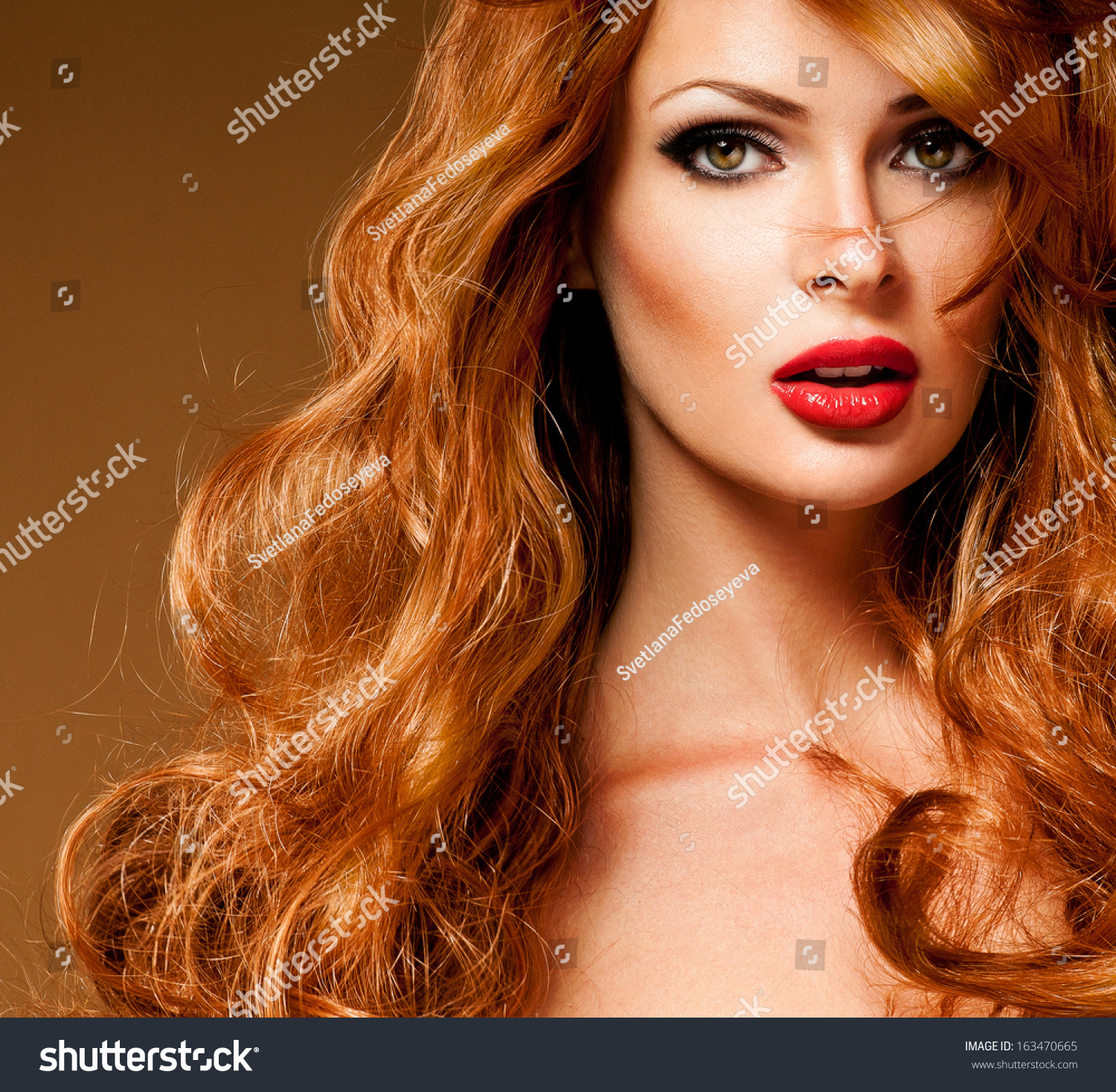 Red Hair Fashion Girl Portrait Long Hair And Red Lipstick Stock