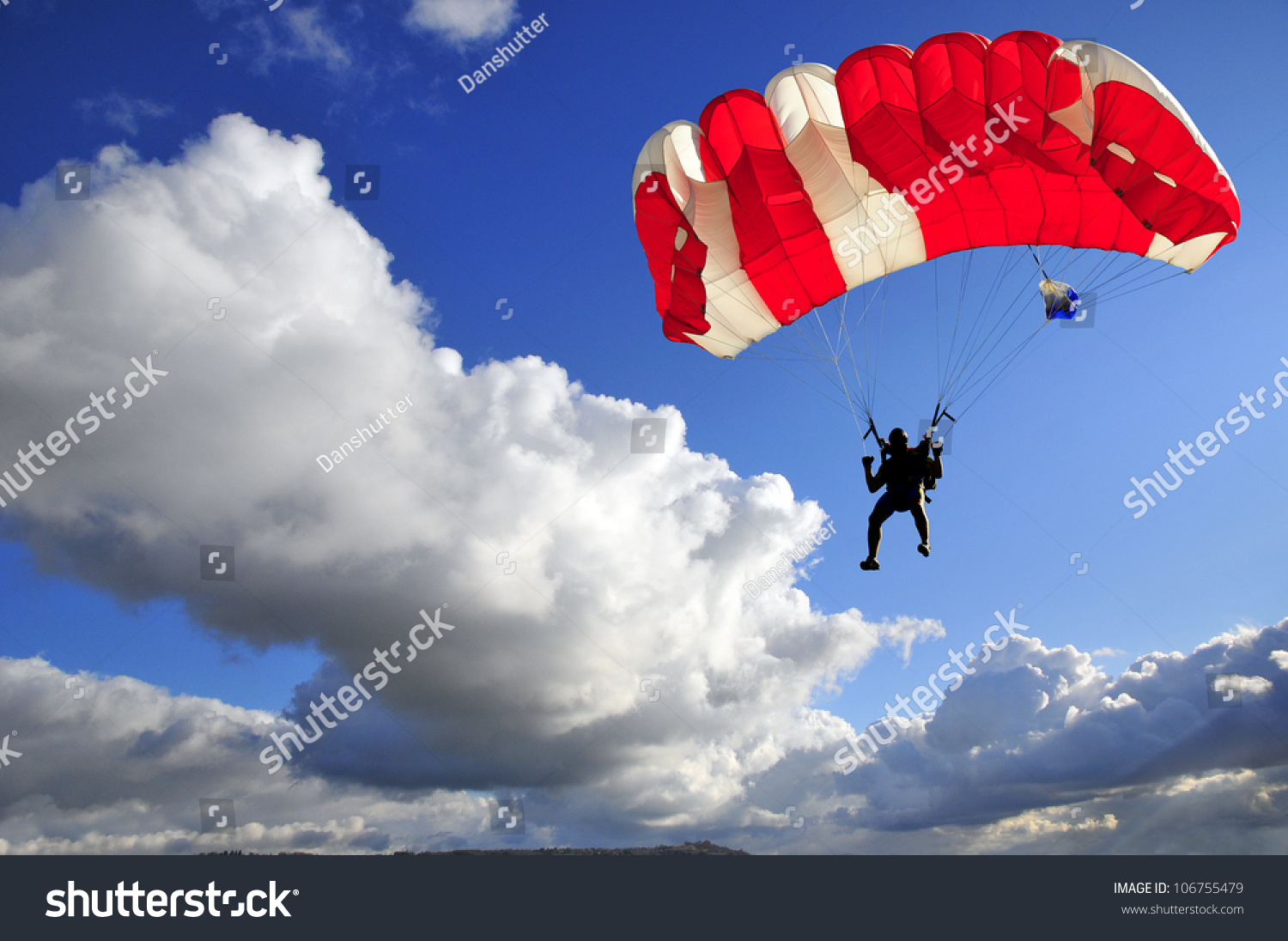 Red Parachute Landing On Stormy Sky. Stock Photo 106755479 : Shutterstock