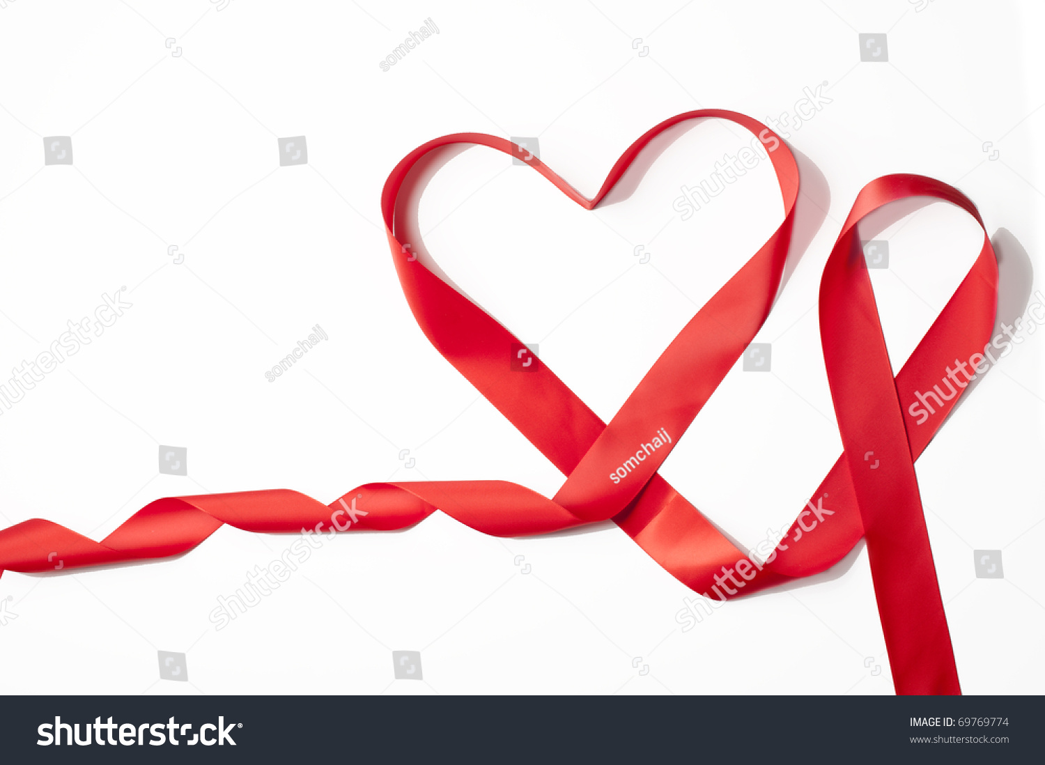 Red Satin Ribbon Forming Heart Shape For Valentines Day Stock Photo