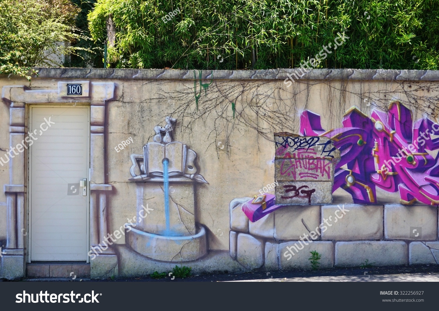 RENNES FRANCE 4 JULY 2015- Graffiti art on street walls and stores in downtown Rennes the capital of the Brittany region of France RENNES FRANCE 4 JULY 2015- Graffiti art on street walls and stores in downtown Rennes the capital of the Brittany region of France