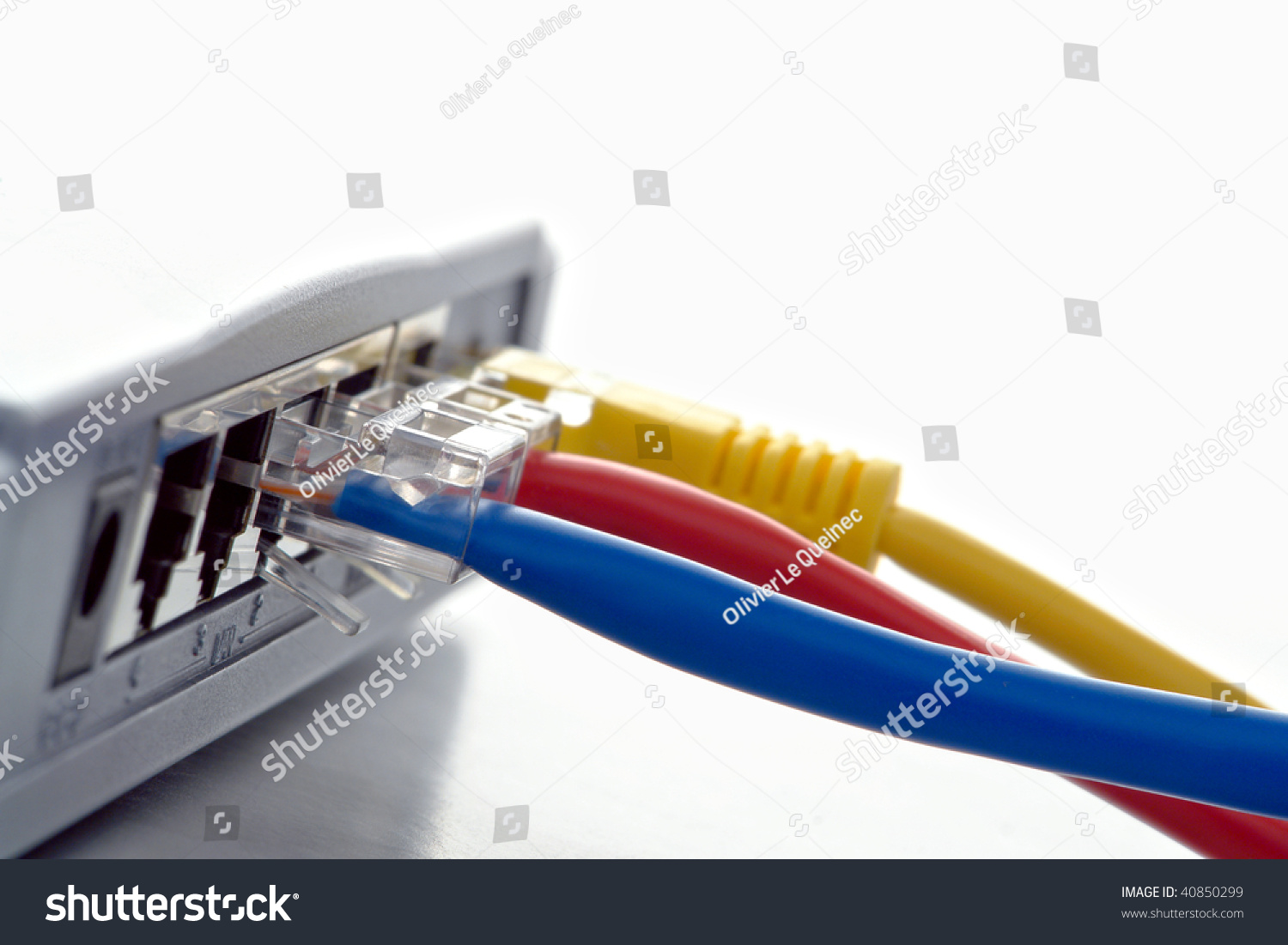 Rj 45 Computer Network Cable Jacks Plugged Into A Router Lan