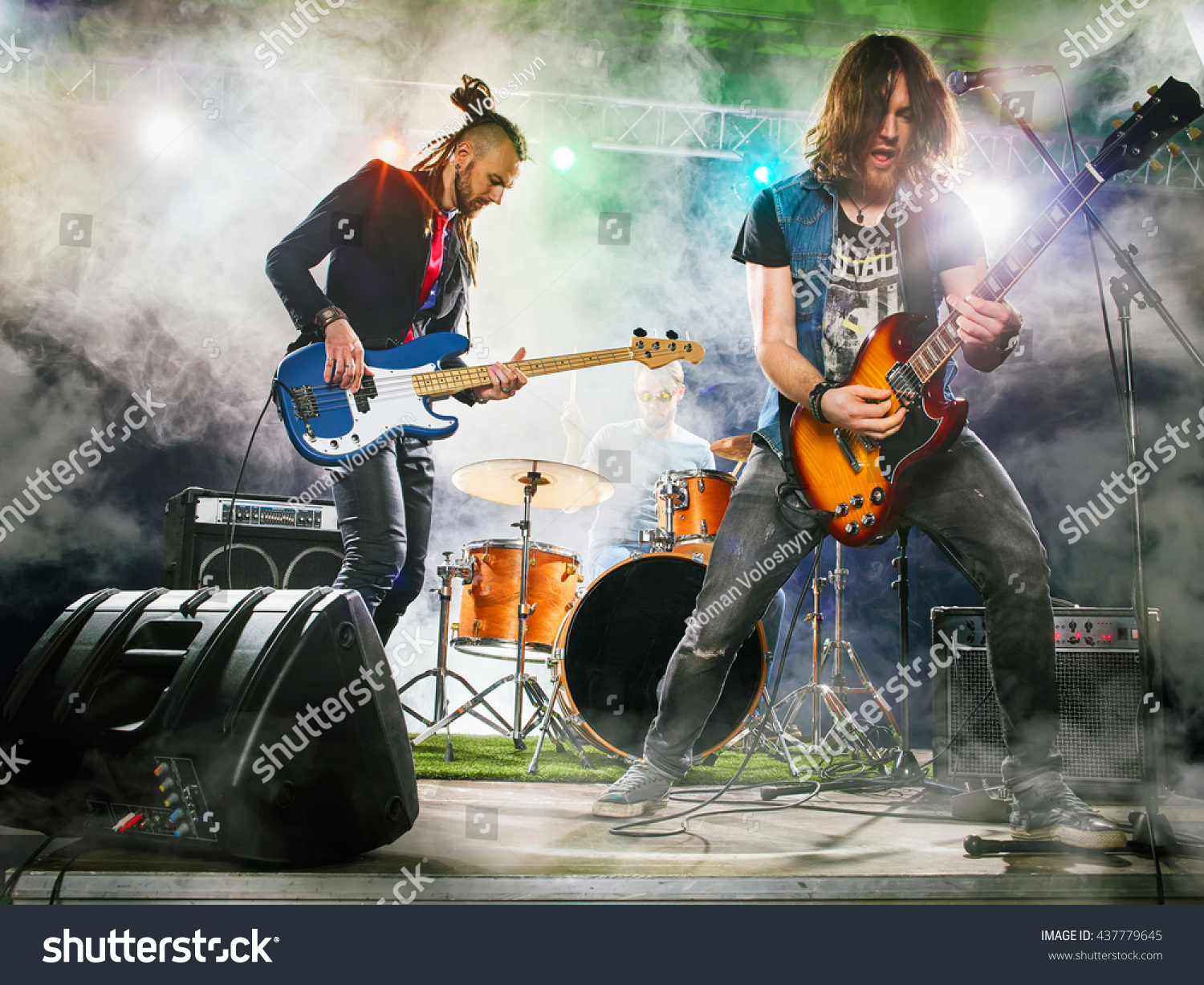 Rock Band Performs On Stage Guitarist Stock Photo Shutterstock