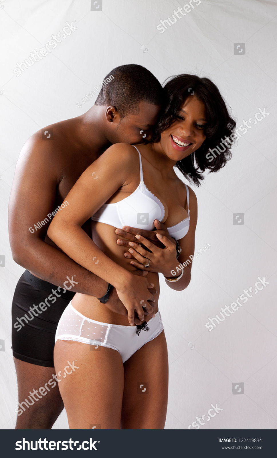 Romantic Married Black Couple In Their Underwear Standing In A Tender Romantic Mood And