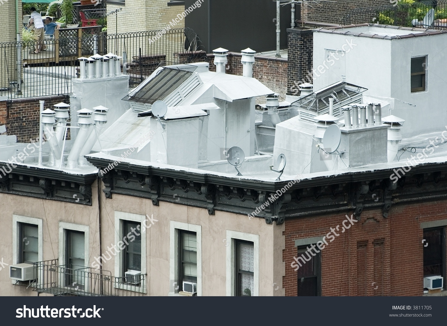 stock-photo-roof-top-of-an-apartment-bui