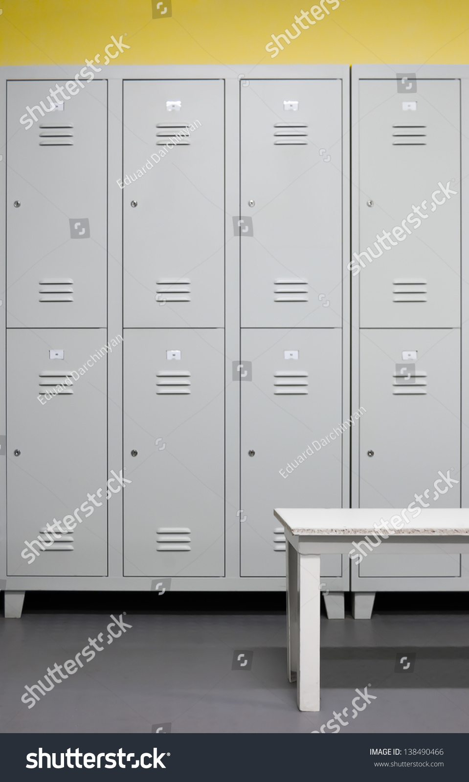 Row Of Steel Lockers With White Bench Stock Photo 138490466 Shutterstock