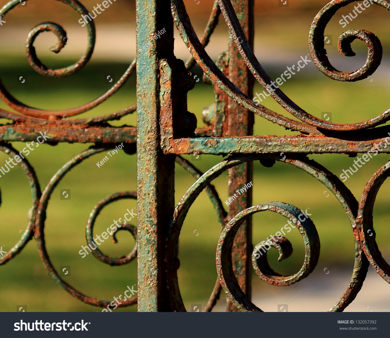 rusted-wrought-iron-garden-gate-chipped-stock-photo-132057392