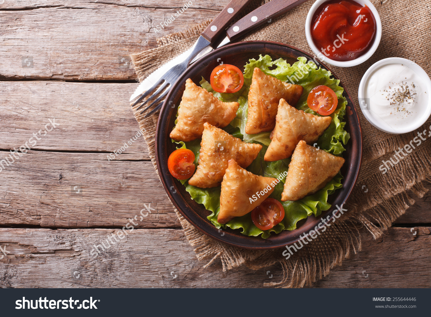 Samosa On A Plate With Sauce And Tomatoes. Horizontal View From Above ...